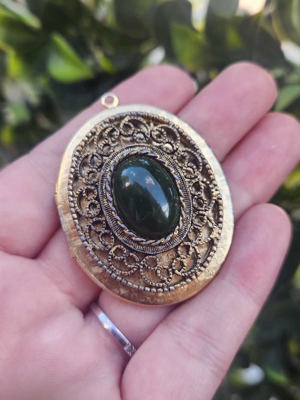 Gold-Tone Filigree Pendant Necklace with Dark Green Stone